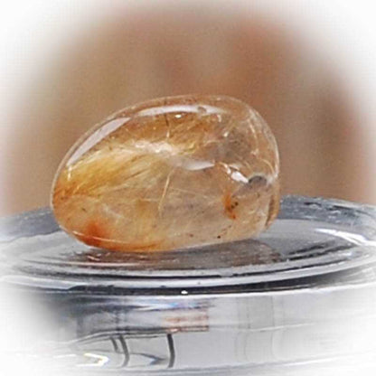 Bergkristall mit Rutilen Trommelstein - Kehuna Stones and Senses